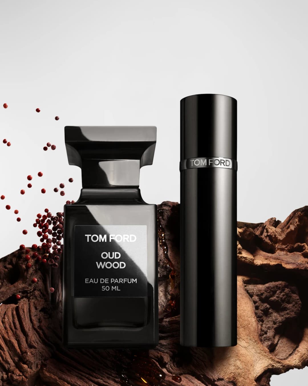 A luxury bottle of Oud Wood fragrance.
